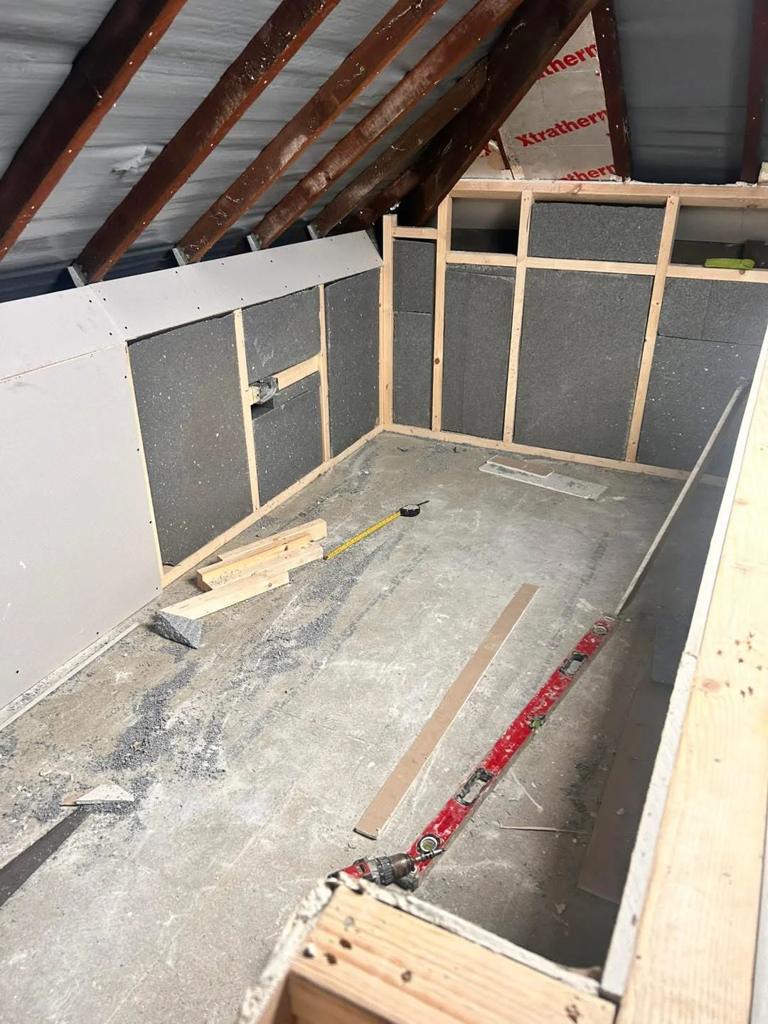 Loft framing, insulation and plasterboard during building work