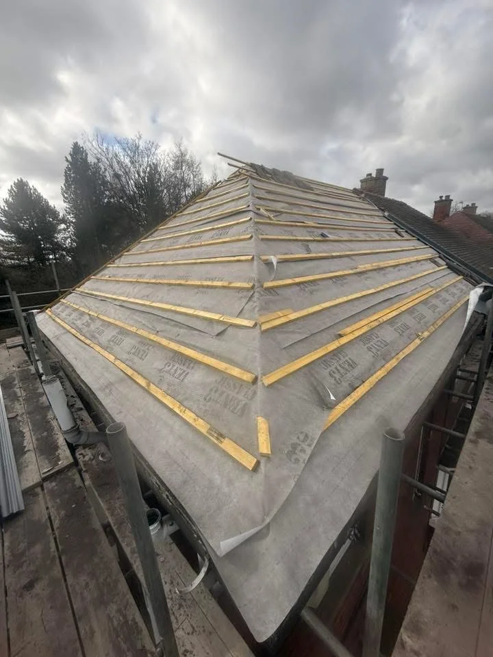 Roof membrane and timber battens during replacement